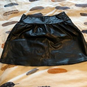 Leather look mini skirt with back zip